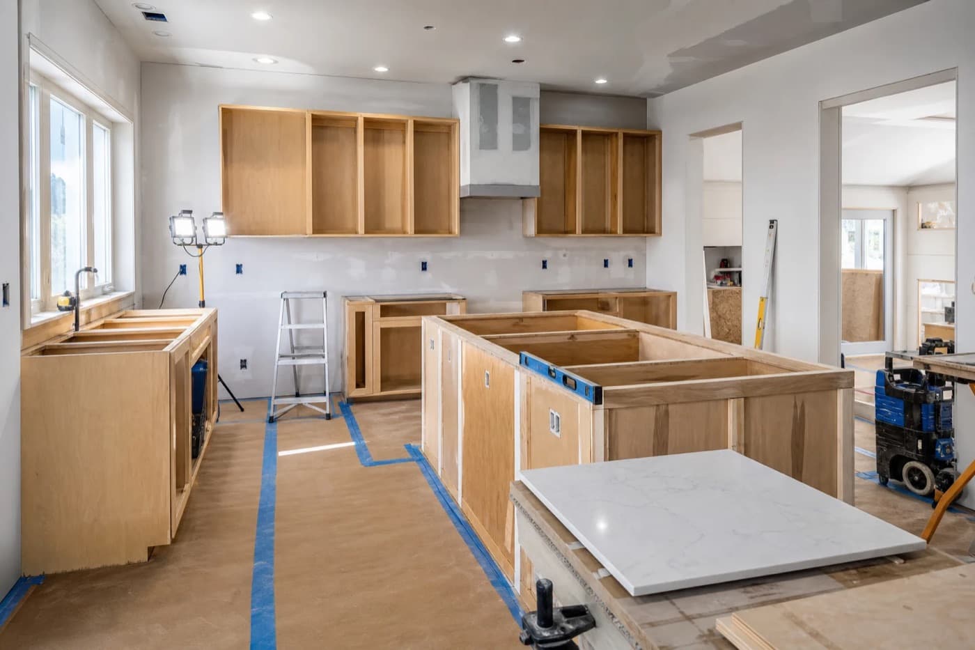 Kitchen remodel in progress with new cabinet boxes set